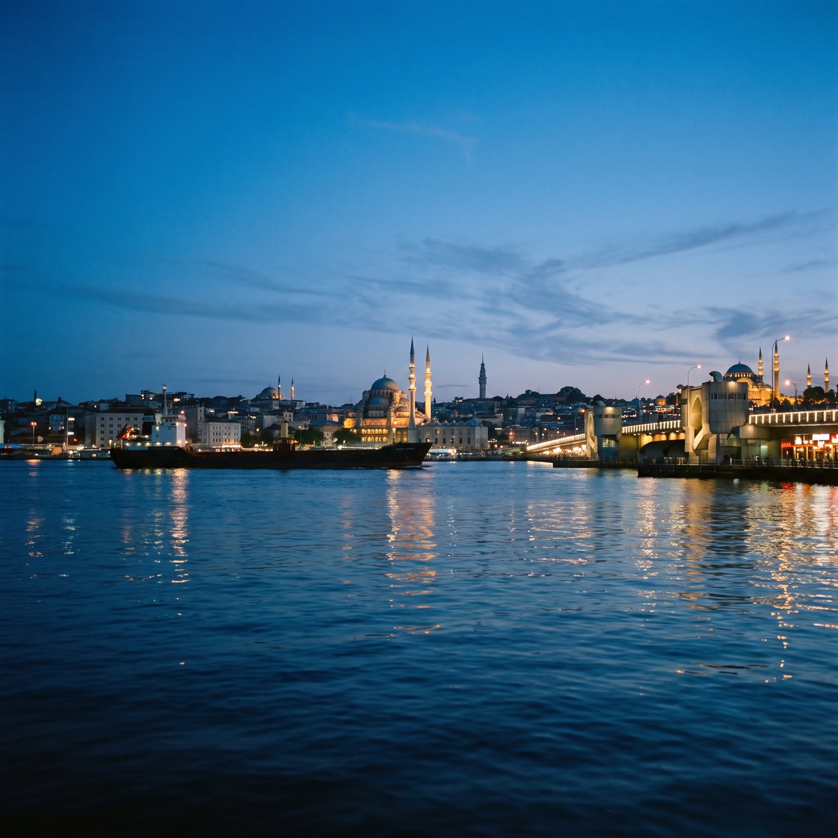 Istanbul skyline over the Golden Horn at blue hour